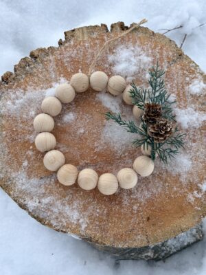 pannunalunen, kranssi, puuhelmi